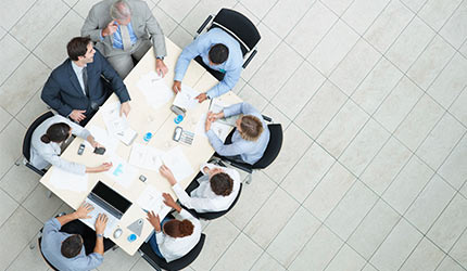 Picture of people around a table