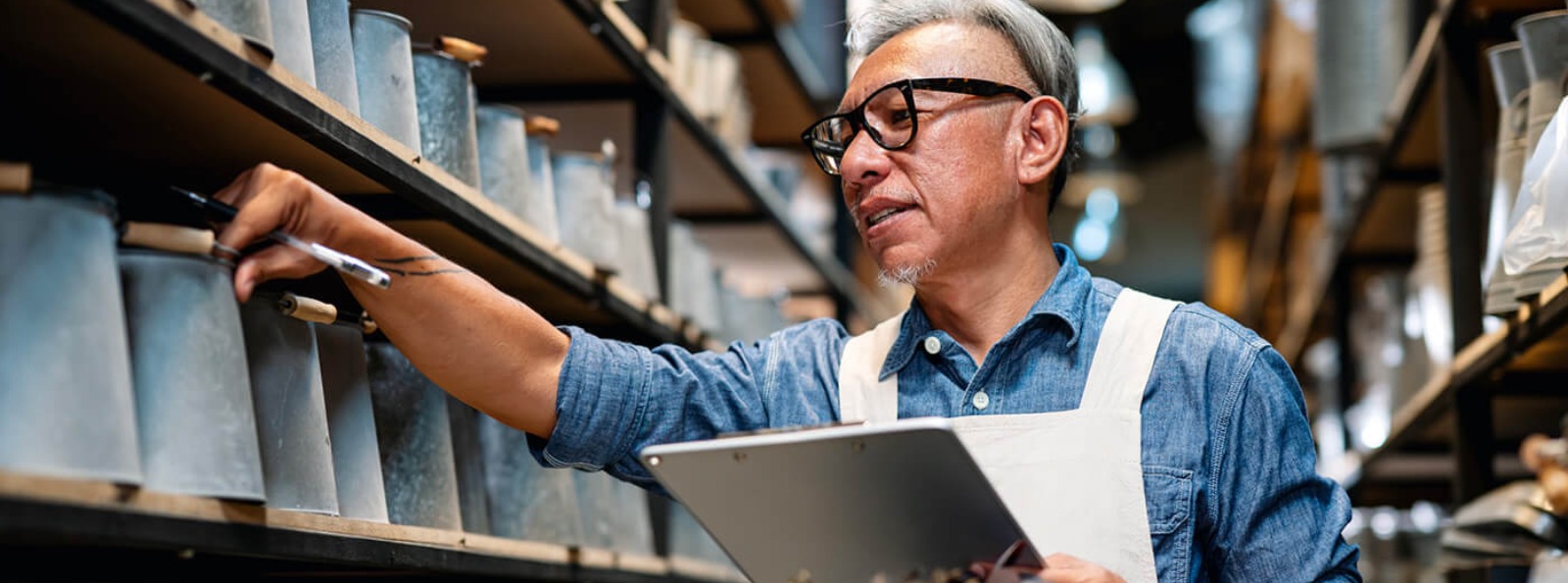 a businessman checking his inventory