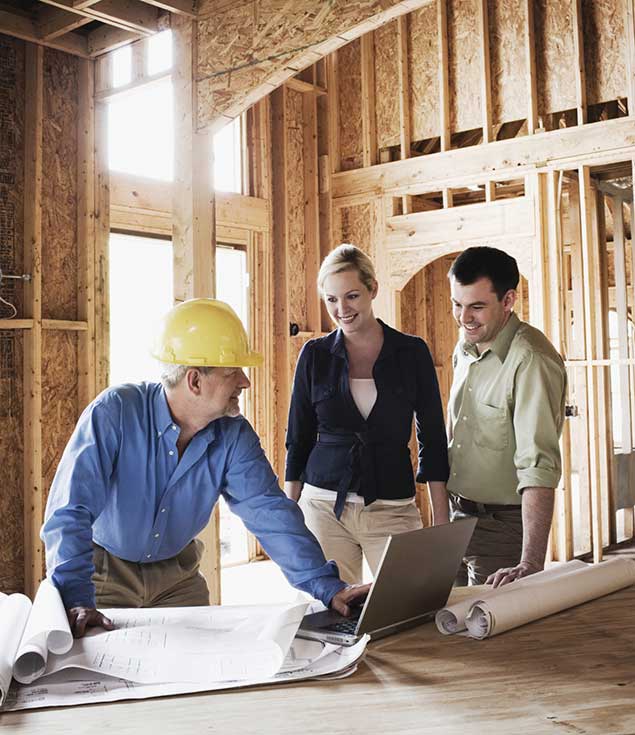 Contractor discussing a new construction with homeowners